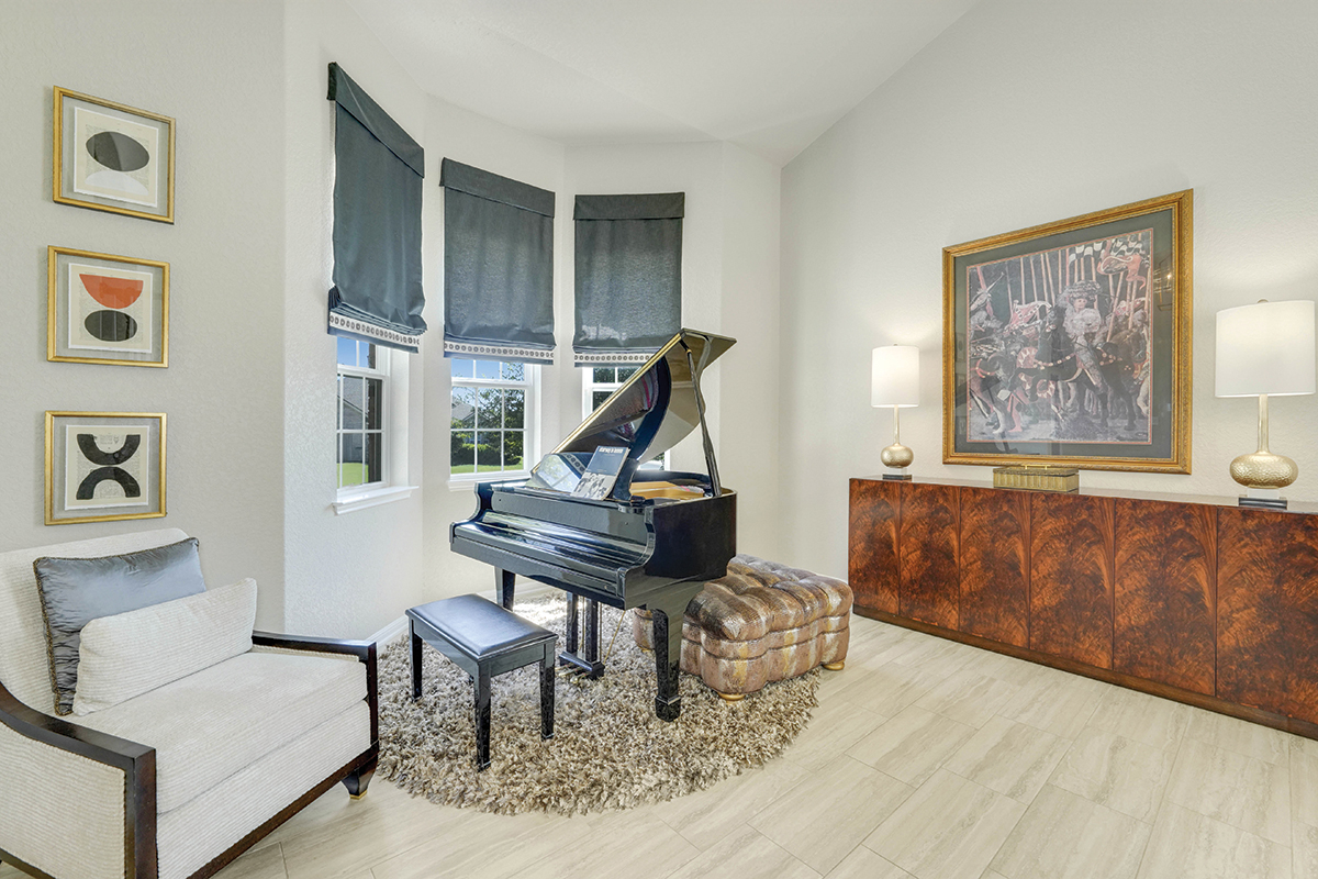 At Home KM Designs piano and chair