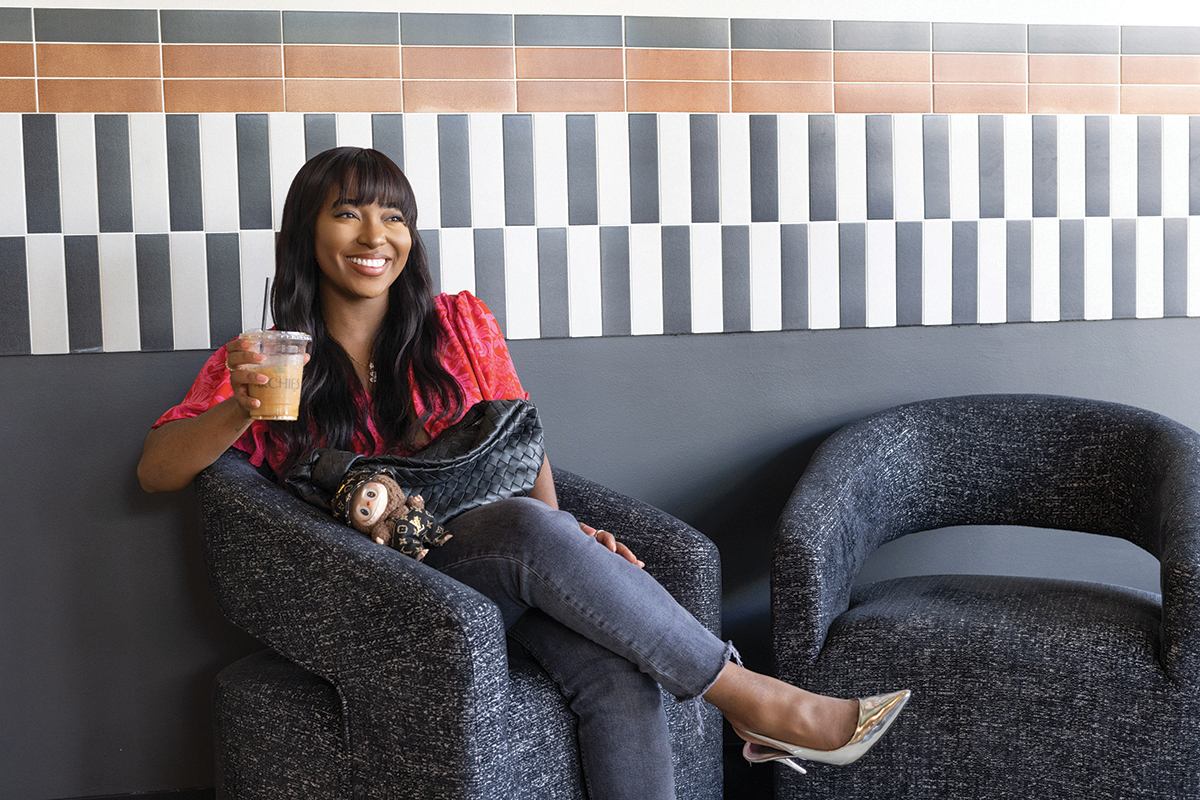 Jada Picket sitting on sofa Jada Picket sitting on sofa